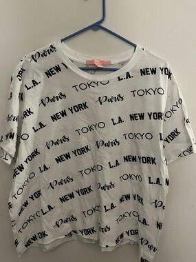 Rebellious One White Tee with Black City Script